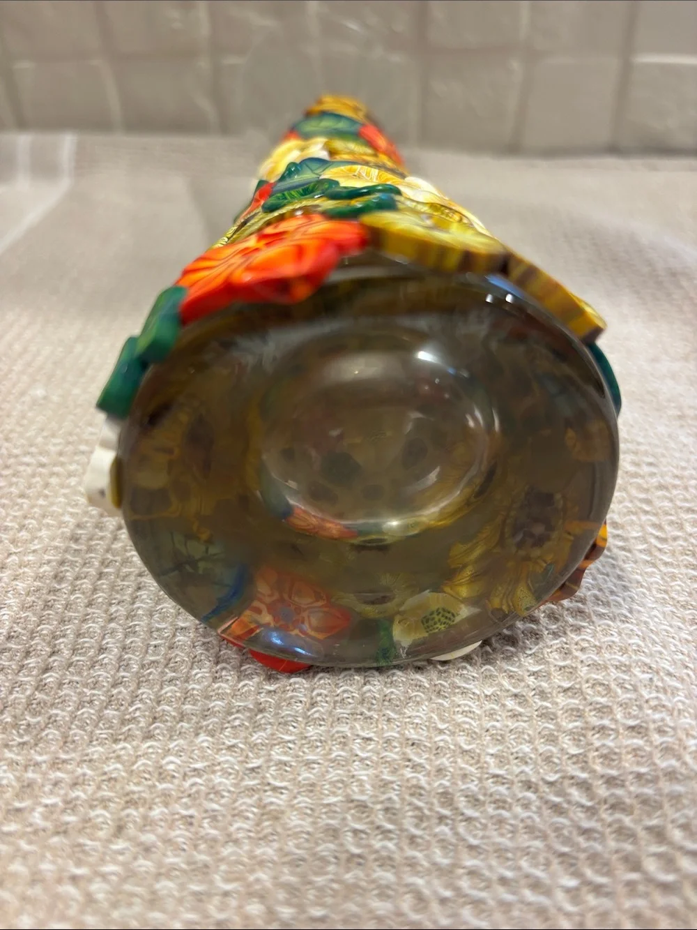 Polymer clay flowers over Glass Vase